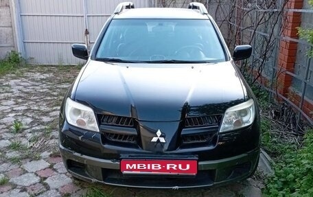 Mitsubishi Outlander III рестайлинг 3, 2007 год, 900 000 рублей, 2 фотография