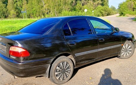 Toyota Avensis III рестайлинг, 2001 год, 425 000 рублей, 10 фотография