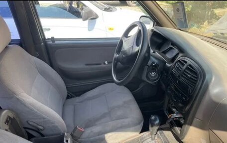 KIA Sportage IV рестайлинг, 2001 год, 250 000 рублей, 3 фотография
