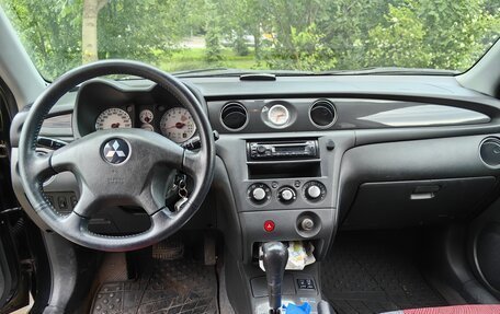 Mitsubishi Outlander III рестайлинг 3, 2007 год, 900 000 рублей, 8 фотография