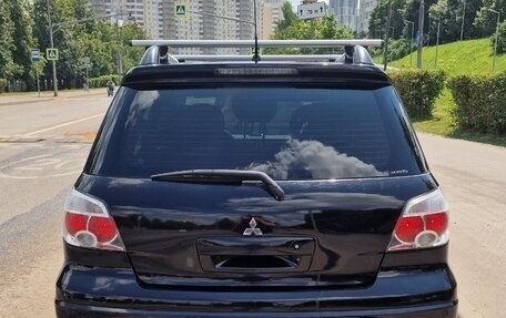 Mitsubishi Outlander III рестайлинг 3, 2007 год, 900 000 рублей, 4 фотография