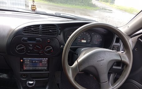 Mitsubishi Mirage VI рестайлинг, 2000 год, 145 000 рублей, 7 фотография