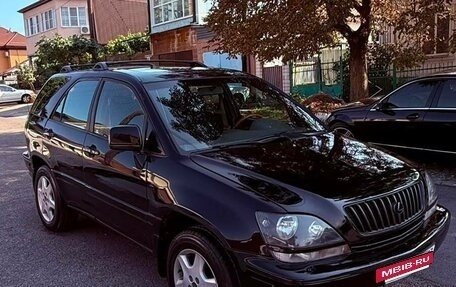 Lexus RX IV рестайлинг, 2000 год, 740 000 рублей, 3 фотография