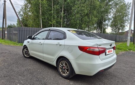 KIA Rio III рестайлинг, 2013 год, 850 000 рублей, 11 фотография