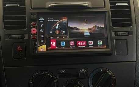 Nissan Tiida, 2012 год, 910 000 рублей, 7 фотография
