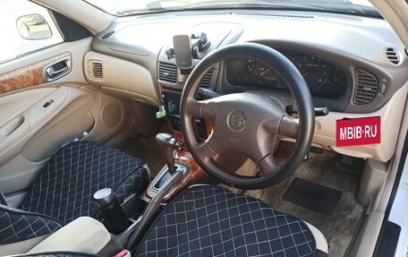 Nissan Bluebird XI, 2001 год, 245 000 рублей, 4 фотография