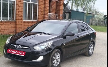 Hyundai Solaris II рестайлинг, 2013 год, 630 000 рублей, 3 фотография