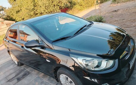 Hyundai Solaris II рестайлинг, 2011 год, 700 000 рублей, 4 фотография