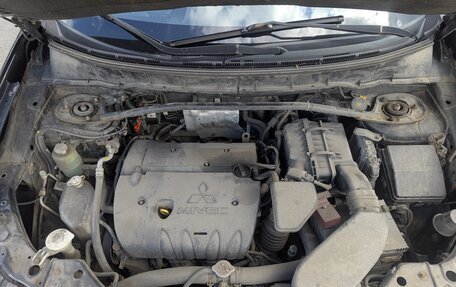 Mitsubishi Outlander III рестайлинг 3, 2010 год, 1 100 000 рублей, 17 фотография