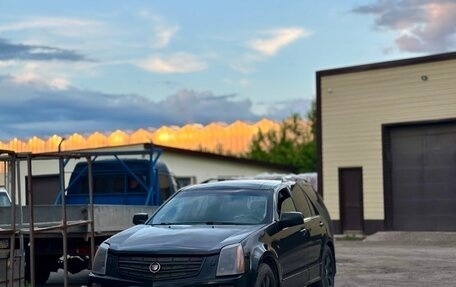 Cadillac SRX II рестайлинг, 2008 год, 450 000 рублей, 1 фотография