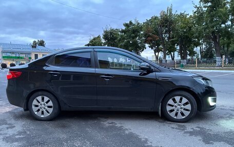 KIA Rio III рестайлинг, 2012 год, 750 000 рублей, 2 фотография