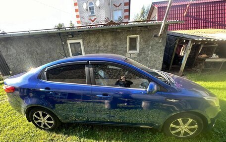 KIA Rio III рестайлинг, 2011 год, 730 000 рублей, 2 фотография