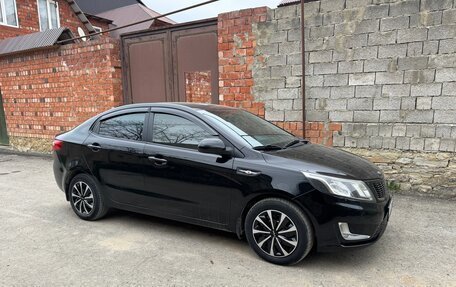 KIA Rio III рестайлинг, 2012 год, 606 000 рублей, 15 фотография