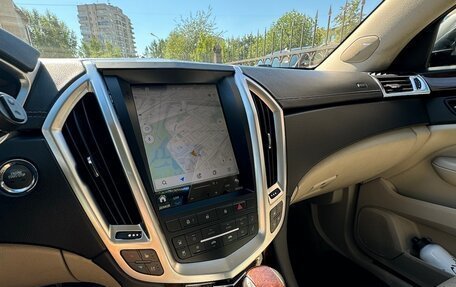 Cadillac SRX II рестайлинг, 2011 год, 910 000 рублей, 3 фотография