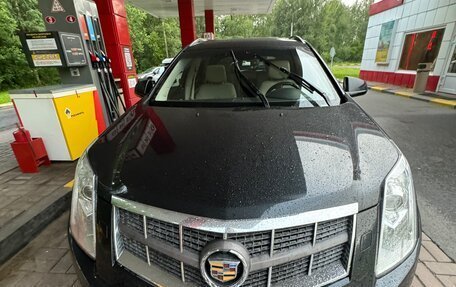 Cadillac SRX II рестайлинг, 2011 год, 910 000 рублей, 18 фотография