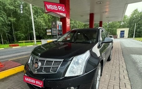 Cadillac SRX II рестайлинг, 2011 год, 910 000 рублей, 23 фотография