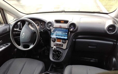 KIA Carens III (RP), 2009 год, 595 000 рублей, 6 фотография