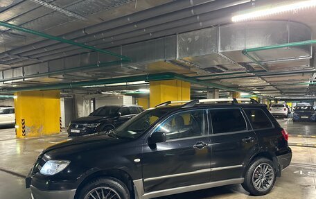 Mitsubishi Outlander III рестайлинг 3, 2008 год, 795 000 рублей, 2 фотография
