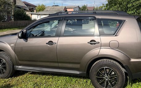 Mitsubishi Outlander III рестайлинг 3, 2012 год, 1 550 000 рублей, 2 фотография