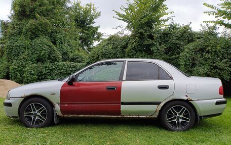 Mitsubishi Carisma I, 2002 год, 250 000 рублей, 10 фотография