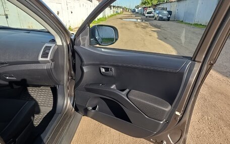 Mitsubishi Outlander III рестайлинг 3, 2011 год, 1 600 000 рублей, 11 фотография