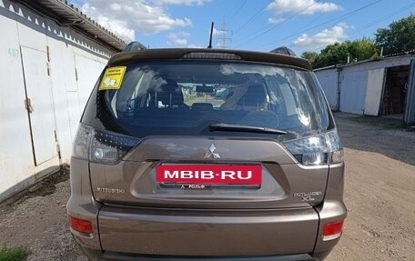 Mitsubishi Outlander III рестайлинг 3, 2011 год, 1 600 000 рублей, 4 фотография