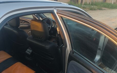 Mitsubishi Carisma I, 2002 год, 240 000 рублей, 24 фотография