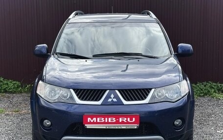 Mitsubishi Outlander III рестайлинг 3, 2008 год, 899 777 рублей, 2 фотография