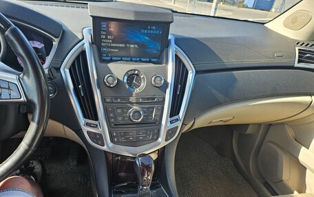 Cadillac SRX II рестайлинг, 2012 год, 1 100 000 рублей, 12 фотография