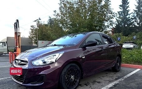 Hyundai Solaris II рестайлинг, 2011 год, 700 000 рублей, 19 фотография