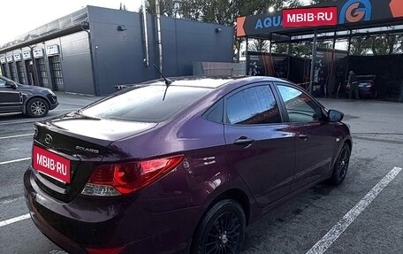 Hyundai Solaris II рестайлинг, 2011 год, 700 000 рублей, 15 фотография