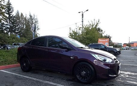 Hyundai Solaris II рестайлинг, 2011 год, 700 000 рублей, 21 фотография