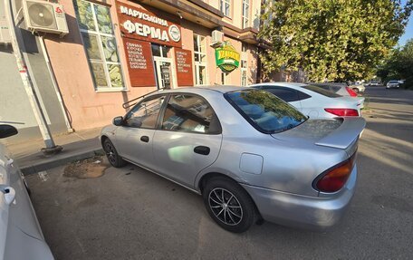 Mazda Familia, 1994 год, 250 000 рублей, 3 фотография