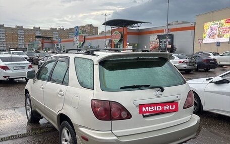 Lexus RX IV рестайлинг, 2000 год, 650 000 рублей, 3 фотография
