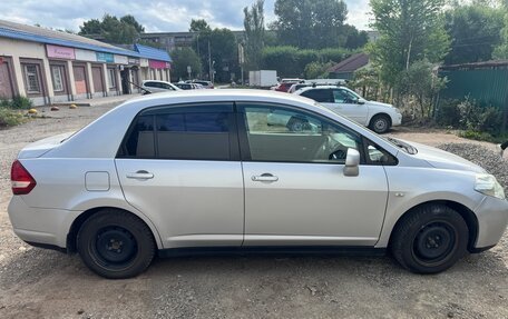 Nissan Tiida, 2010 год, 670 000 рублей, 4 фотография