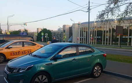 KIA Rio III рестайлинг, 2011 год, 650 000 рублей, 2 фотография