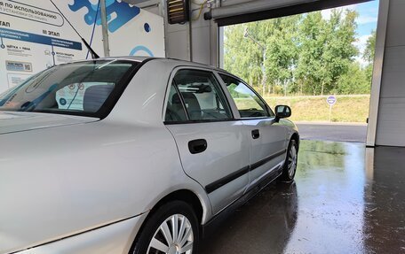 Mitsubishi Carisma I, 2003 год, 350 000 рублей, 10 фотография