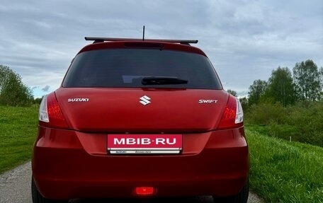 Suzuki Swift IV, 2011 год, 850 000 рублей, 13 фотография