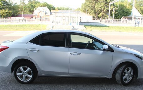 Toyota Corolla, 2013 год, 1 150 000 рублей, 14 фотография