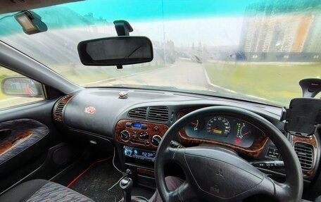 Mitsubishi Mirage VI рестайлинг, 1998 год, 200 000 рублей, 10 фотография