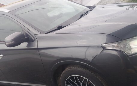 Mitsubishi Outlander III рестайлинг 3, 2014 год, 1 500 000 рублей, 13 фотография