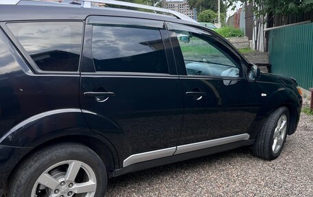 Mitsubishi Outlander III рестайлинг 3, 2007 год, 1 070 000 рублей, 4 фотография
