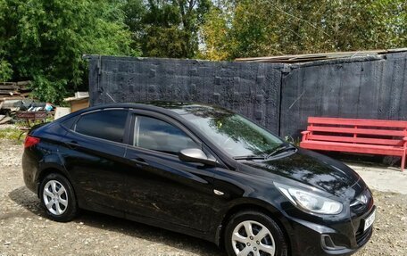 Hyundai Solaris II рестайлинг, 2012 год, 750 000 рублей, 12 фотография