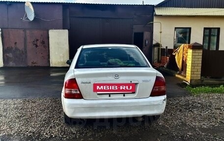 Mazda Familia, 2000 год, 150 000 рублей, 3 фотография