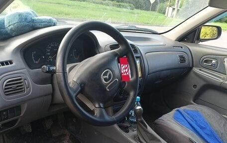 Mazda 323, 2000 год, 150 000 рублей, 18 фотография