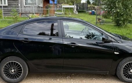 Hyundai Solaris II рестайлинг, 2011 год, 650 000 рублей, 7 фотография