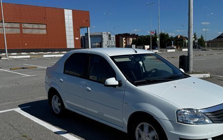 Renault Logan I, 2013 год, 735 000 рублей, 3 фотография