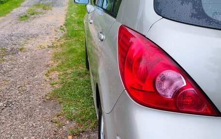 Nissan Tiida, 2011 год, 850 000 рублей, 4 фотография