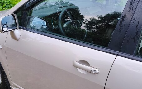 Nissan Tiida, 2011 год, 850 000 рублей, 6 фотография