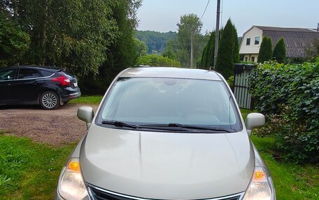 Nissan Tiida, 2011 год, 850 000 рублей, 21 фотография